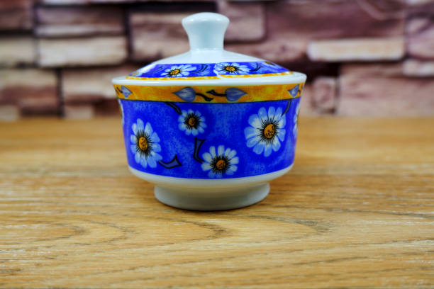 istock Floral design ceramic jar isolated on color background close-up view single object 1886201420