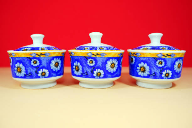 istock Floral pattern blue color ceramic jars together isolated on color background close-up view 1886201495