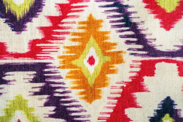 istock Oriental design colored Uzbek fabric khan atlas, adras 1886241397