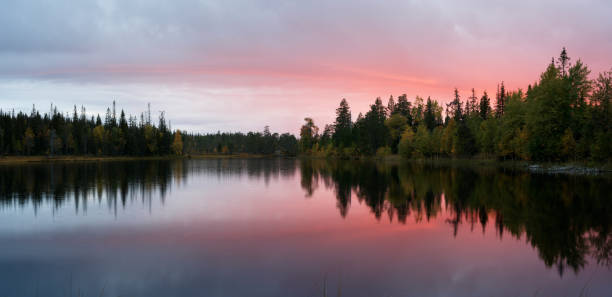 istock Autumn evening by a lake 1886244490