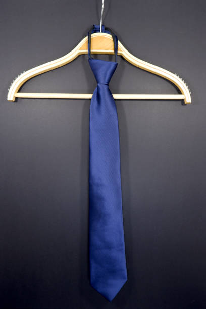 istock A zipper necktie hanging with dark background close-up view single object 1886245009