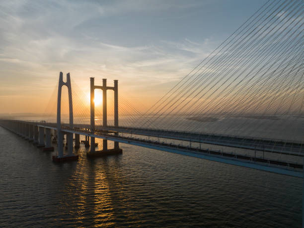 istock Cross-sea bridge sunrise landscape 1886359166