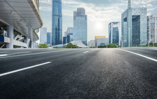 istock Empty asphalt and city buildings landscape in summer 1886370216