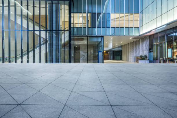 istock Empty square floor and city glass building landscape 1886371249