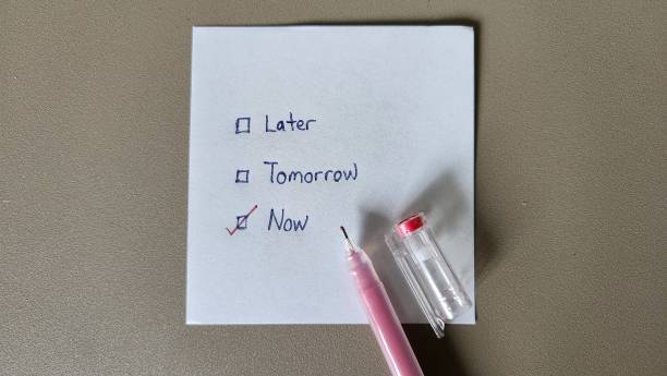 istock Stop procrastinate concept. Checklist whether to do a task later, tomorrow or now 1886388644