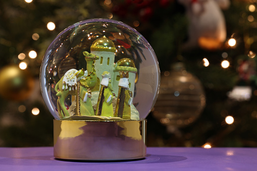Christmas themed snow globes for sale at a Christmas market