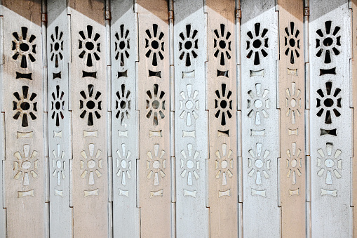 Close up white pattern metal shutter door