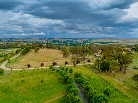 Early evening Summer Storm approaching over the fields on a rural property at Blayney in the Central West of NSW, Australia.