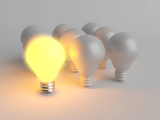 istock Illuminated light bulb standing Out in Crowd. Creative idea and inspire innovation 1886527518