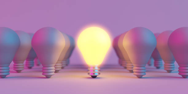 istock Illuminated light bulb standing Out in Crowd. Creative idea and inspire innovation 1886528035