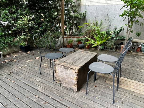 istock empty bench and wooden table in the park 1886545474