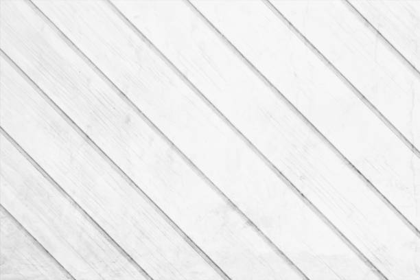 istock Light grey or white coloured wooden plank like striped messy dirty stained grunge textured blank empty horizontal vector backgrounds with slanting gray stripes 1886558911