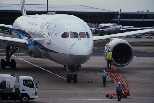 Narita, Japan – May 22, 2019: An airplane parked on a tarmac at an airport in Narita, Japan