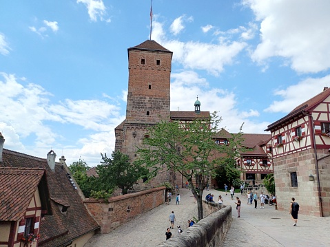 Nuremberg, Germany - Jun 10, 2023: Tourists enjoy sightseeing at Nuremberg castle, Germany.