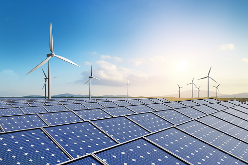 Clean energy, Solar farm and wind turbine with beautiful blue sky background. 3D rendering.