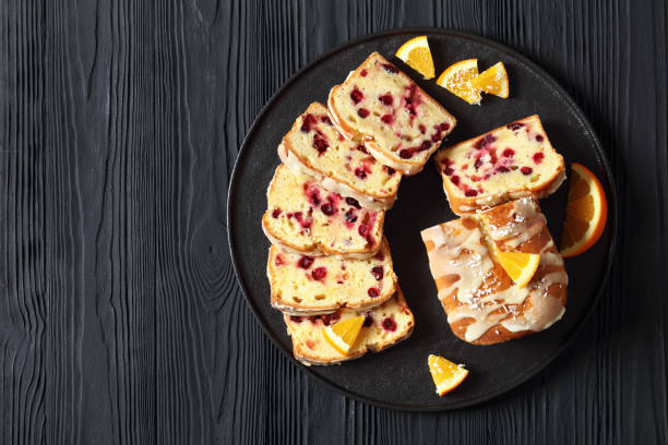 istock orange cranberry loaf with orange glaze, top view 1886719349