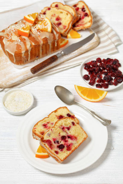 istock orange cranberry loaf with orange glaze, top view 1886719350