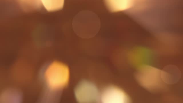Bokeh on a brown background.