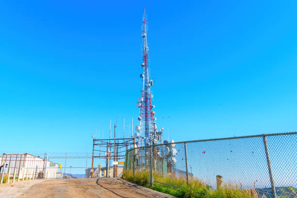 Los Angeles, California - February 1, 2023: LA Central Communications Tower with a Bunch of Antennae and the Maintenance Building in the Vicinity of the Hollywood Sign