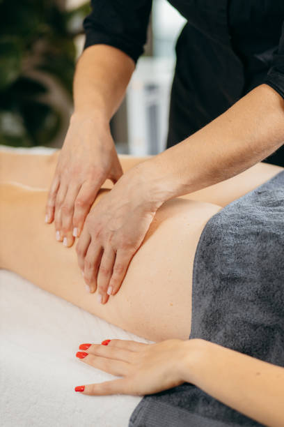 istock Female hands doing leg massage 1886766646