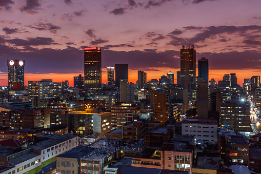 Johannesburg evening cityscape of the city centre, Johannesburg is also known as Jozi, Joburg or eGoli and is the largest city in Southern Africa.