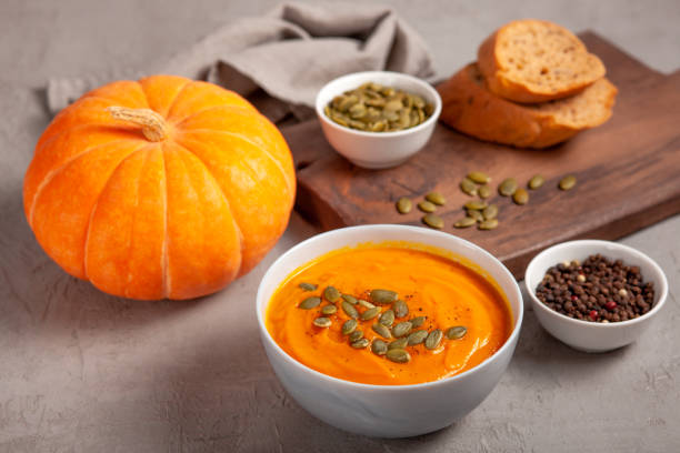istock Pumpkin soup with seeds and spices 1886831789