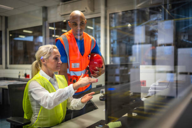 istock Shipping operator showing orders list to worker 1886894306