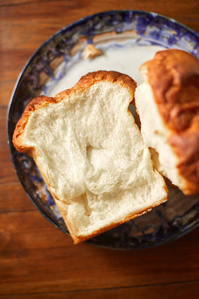 istock fresh bake breads whole wheat sliced close up. 1886911369