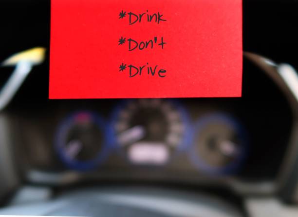 istock Red stick note with text written DRINK DON'T DRIVE  on the car steering wheel , to remind driver to have safety awareness , no driving when drunk 1886980844