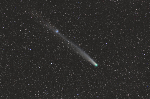 Photo of a real comet in the night sky.