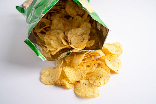 istock Potato chips, delicious spicy for crips, thin slice deep fried snack fast food in open bag. 1887020776