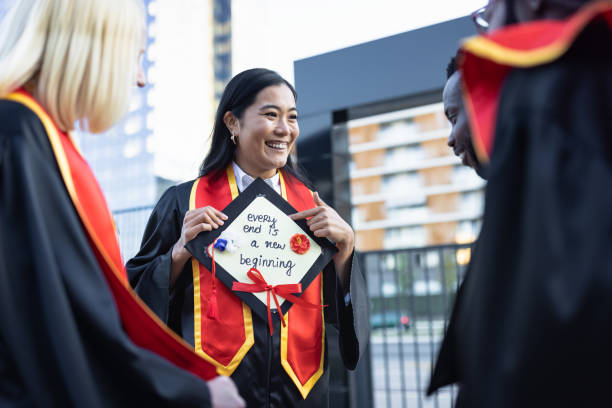 istock Students waiting on university graduation ceremony 1887024946
