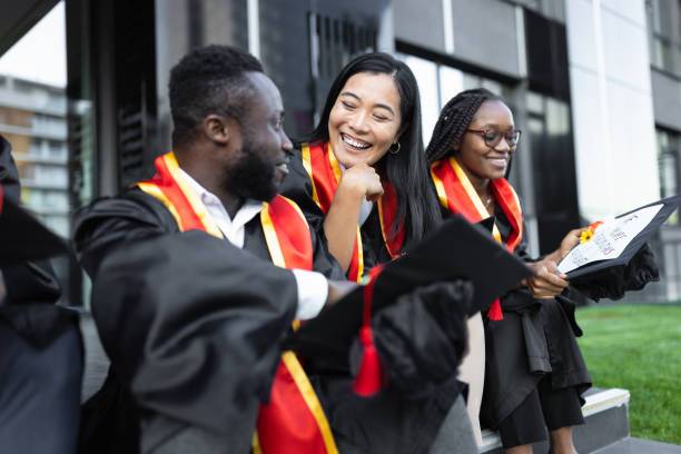 istock Students waiting on university graduation ceremony 1887030615