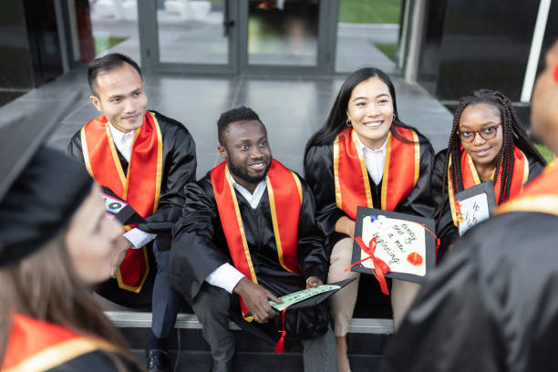 istock Students waiting on university graduation ceremony 1887043716