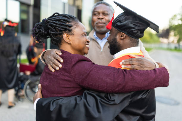 istock Graduation University. Proud parents 1887046902