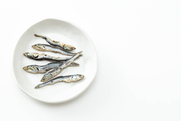 istock Dried sardines on a white background. 1887049534