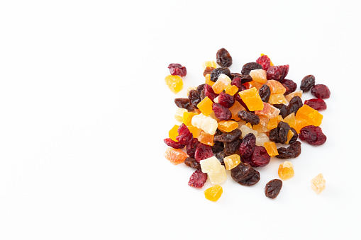 Dried fruits on a white background.
