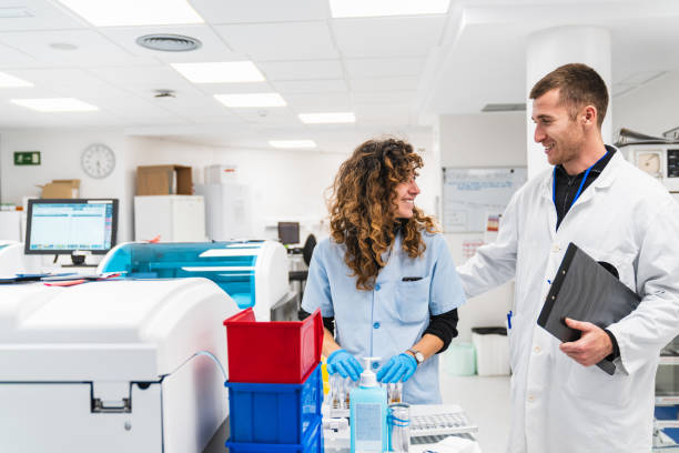 istock Healthcare Professionals Analyzing Blood Samples in Modern Lab 1887056344