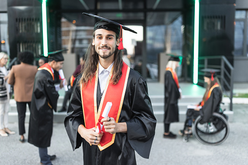 Proud graduated male student