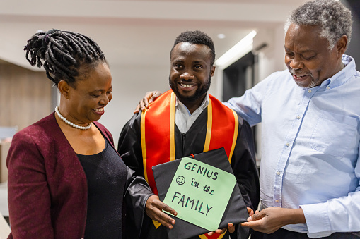University graduation celebration. Black family