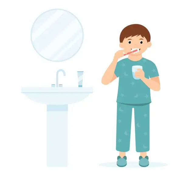 Vector illustration of Little  boy in pajamas brushing teeth