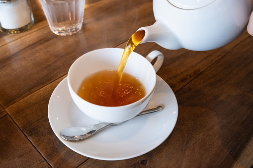 Earl Grey tea poured in a teapot