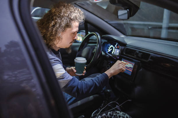 istock Connecting my phone to the car before going to work 1887084894