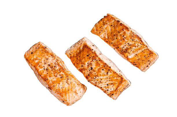 istock Fried Salmon Fillet Steaks  Isolated on white background, top view. 1887102173