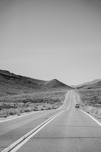 black and white photo of a road in desert, Death Valley