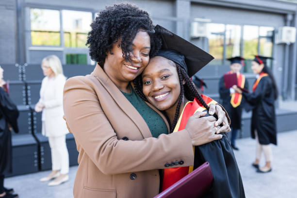 istock Mother and daughter celebrating graduation 1887120072