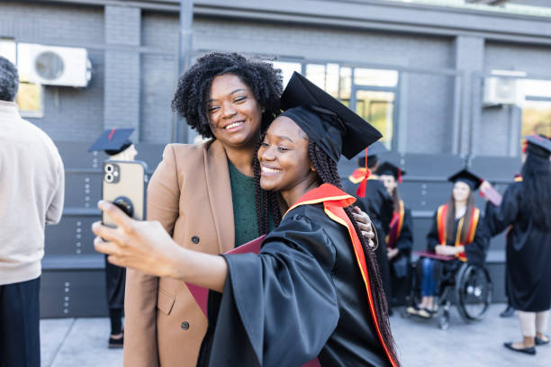 istock Mother and daughter celebrating graduation 1887120242