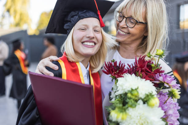 istock Mother and daughter celebrating graduation 1887122154