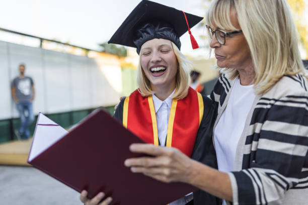 istock Mother and daughter celebrating graduation 1887122672