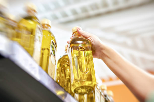 istock Sunflower oil in hand 1887216627